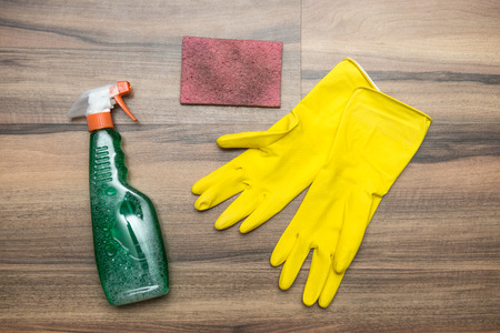 Cleaning concept. Cleaning tools: spray, rubber gloves and spongeの写真素材