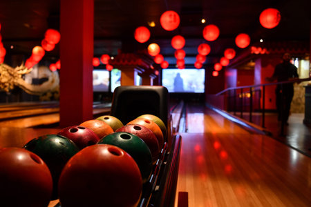 Bowling lane and balls in the row in bowling center.の写真素材