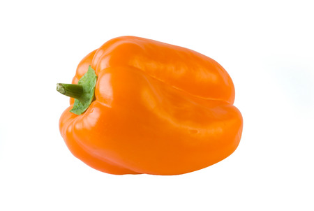 orange bell pepper isolated on whiteの写真素材
