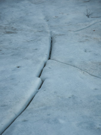 Cracks in lake ice in springtime in Finlandの写真素材