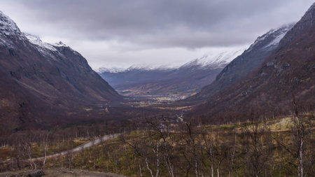 Valley between snowy mountains in northern Norwayの写真素材