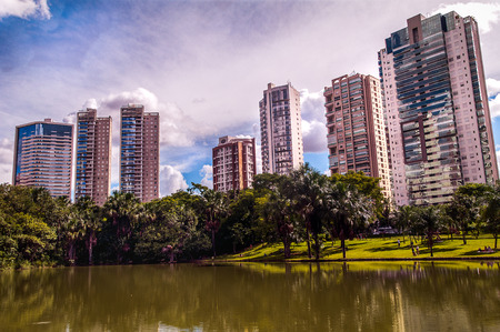 view of the city, modern building between the sky and a lakeの写真素材