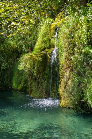 small hidden waterfall at plitvice lakes national park in Croatiaの写真素材