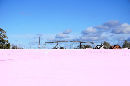 baltic sea drawbridge on river and oceanの写真素材