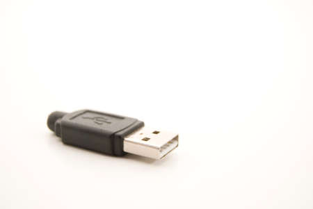 Close-up image of a USB plug with its cable torn off.の写真素材