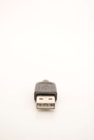 Close-up image of a USB plug with its cable torn off.の写真素材