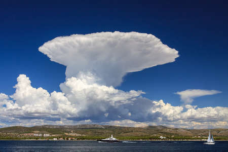 Huge cumulonimbus cloud over the sea coast. Photo taken in Dalmatia (Croatia)の写真素材