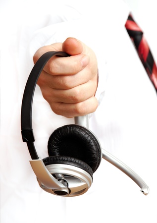 	Headphones in hand.の写真素材