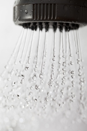 Shower and flying water drops.の写真素材