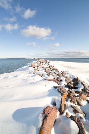 Breakwater in winter の写真素材