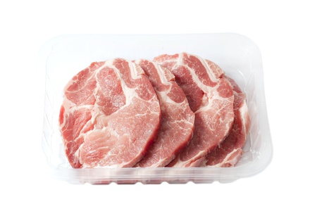 Meat in box isolated on white の写真素材