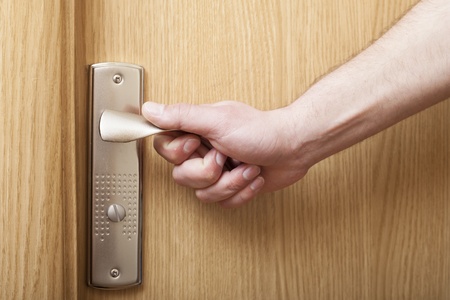 Man s hand opoening door の写真素材