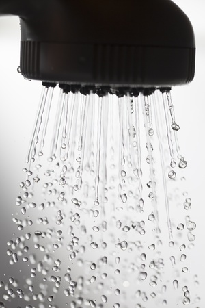 Showerhead and falling water drops の写真素材