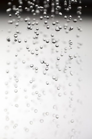 Flying drops of water の写真素材