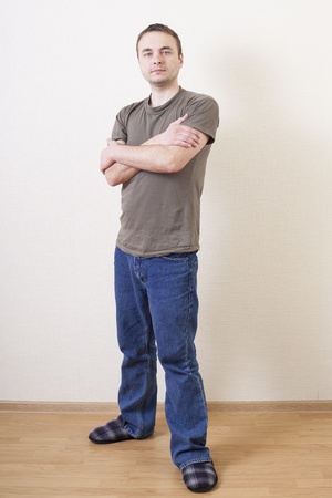 Man leaning against wall の写真素材