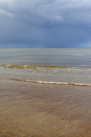 Dark sky over gulf of Riga, Baltic sea の写真素材