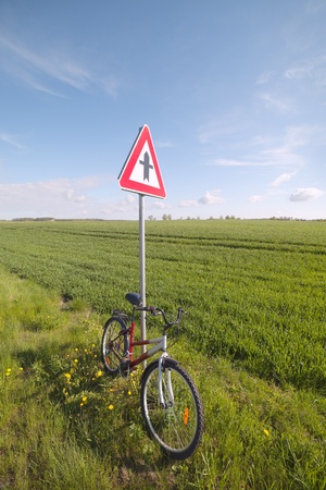Cycle and road sign の写真素材