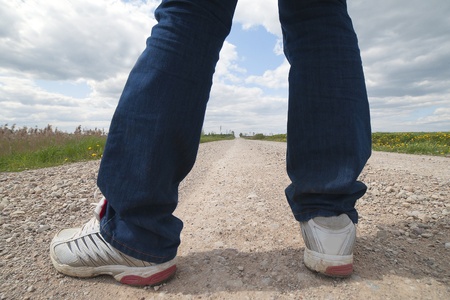 Legs on the gravel road の写真素材