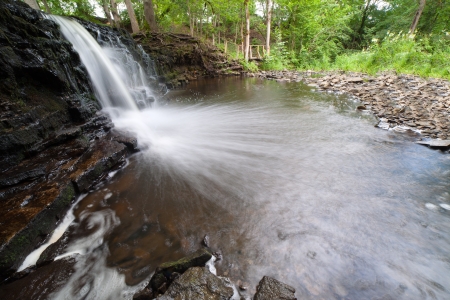 Waterfall on small river Ivande  in Latvia, Baltic states の写真素材