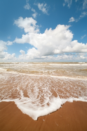 Waves on sand at Baltic  sea coast の写真素材