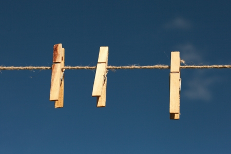 Clothespins on string の写真素材