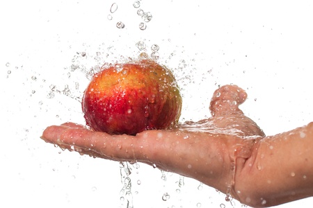 Apple, hand and water の写真素材