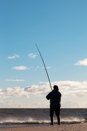 Fisherman at Baltic sea の写真素材