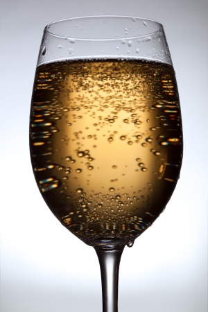 Golden drink in glass の写真素材