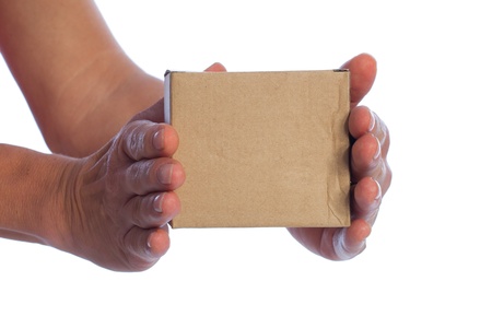 Cardboard box in hands isolated on white の写真素材
