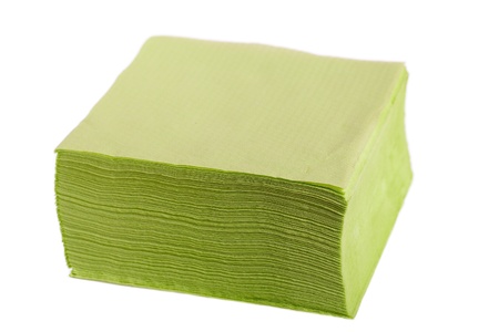 Stack of green paper napkins isolated on white の写真素材