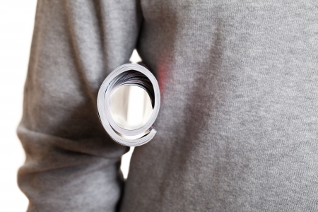 Rolled magazine in armpit の写真素材