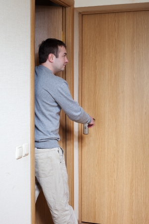 Man at doors の写真素材