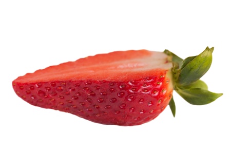 Half of strawberry isolated on white background  の写真素材