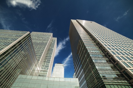 Blue sky over skyscrapers in London Doclands financial district, United Kingdom 
