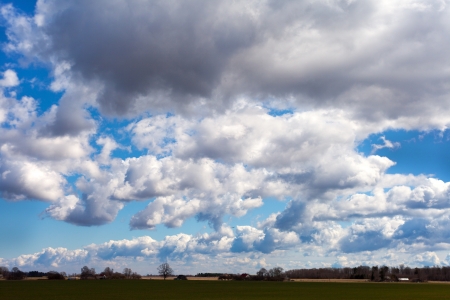Clouds over land in springtime の写真素材