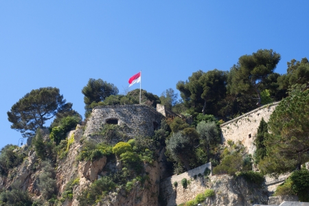 Monaco flag on Monaco coast の写真素材