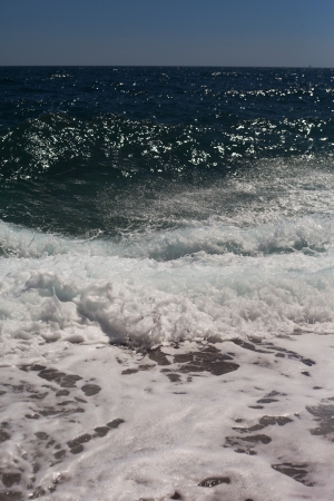 Foamy waves of Mediterraneann sea at French Riviera coast の写真素材