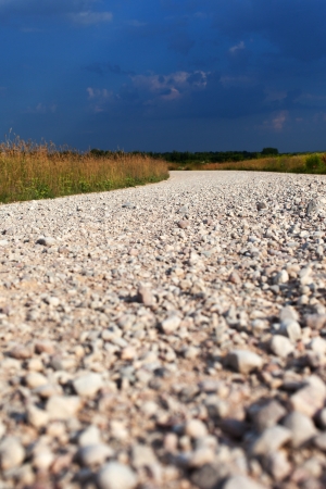 Rural road in evening light の写真素材