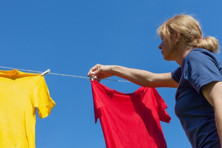 Drying of shirts in nice and sunny day.の写真素材