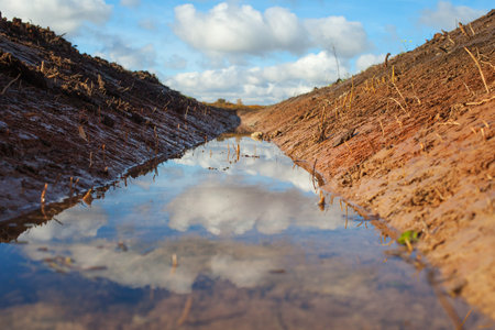 New ditch in farmland.