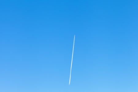 Airplane in blue sky.の写真素材