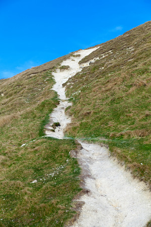 Trail to the top of hill.の写真素材