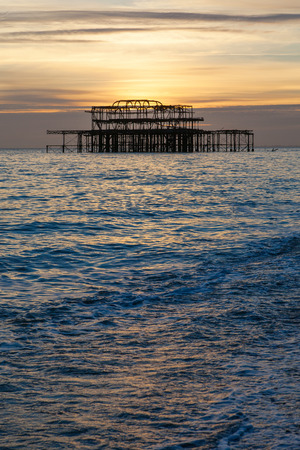 Brighton west pier at sunset, East Sussex, England, United Kingdom.の写真素材