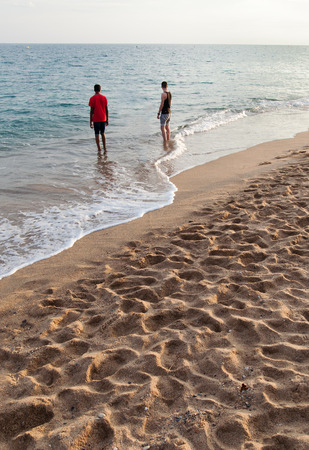 People in Mediterranean sea beachの写真素材