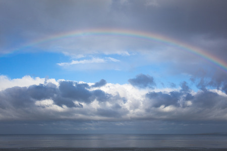 Rainbow over gulf of Riga, Baltic sea.の写真素材