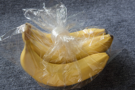 Bananas in plastic bag.の写真素材