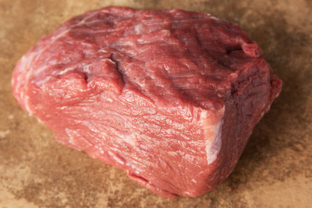 Raw meat on the table.