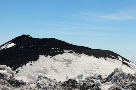 Brave people on volcano Etna slope, Sicily, Italy.の写真素材
