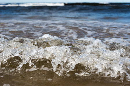 Splashing wave at Baltic sea coast.