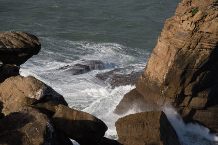 Atlantic waves on cliffs near Peniche, Portugal.の写真素材